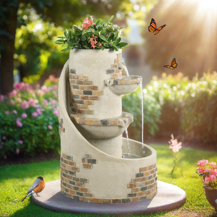 the fountain is in the center of a lush garden with wildlife gathering around