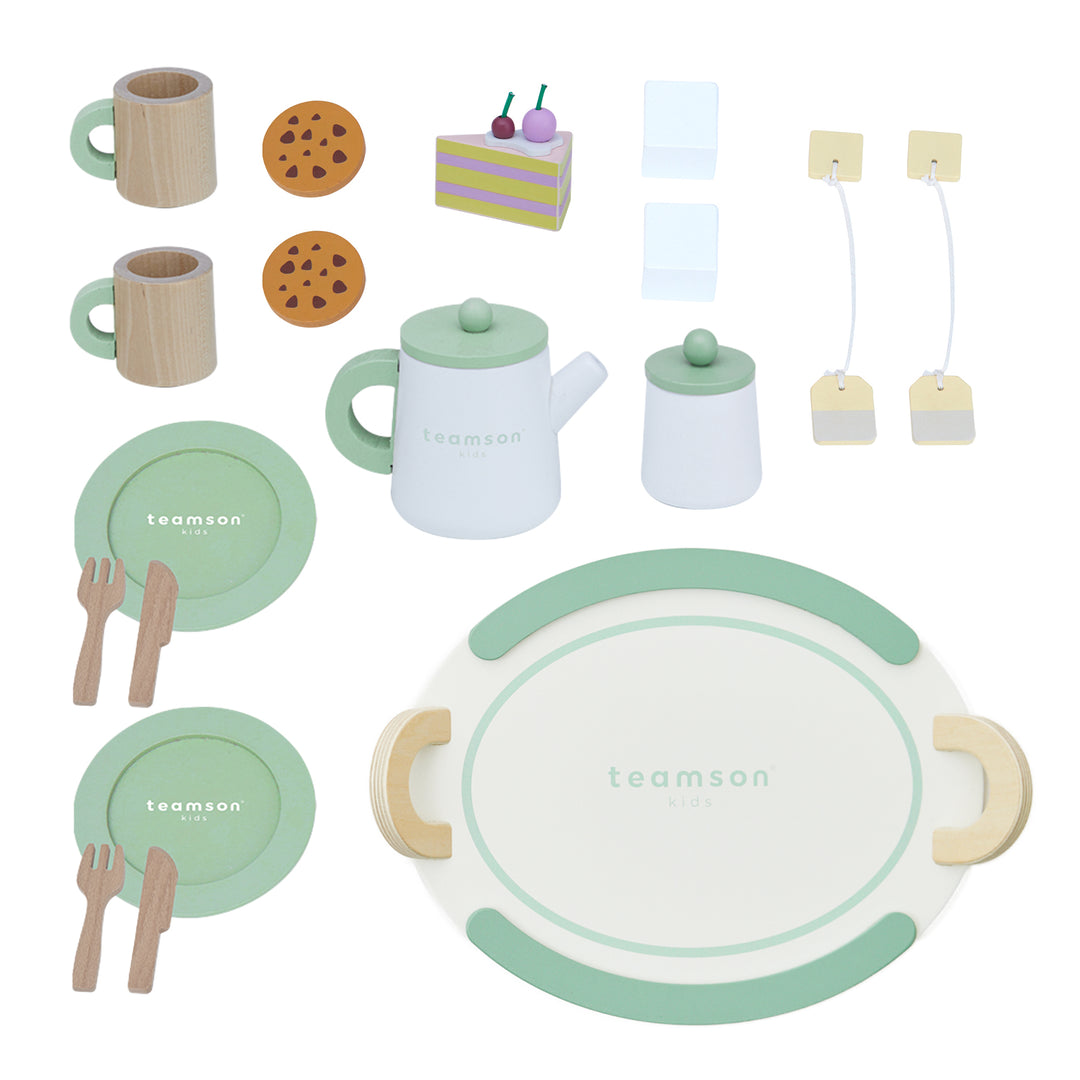 A toy tea set featuring a tray, teapot, cups, plates, forks, cookies, tea bags, and a slice of cake, all with a white and green color scheme from Teamson Kids.
