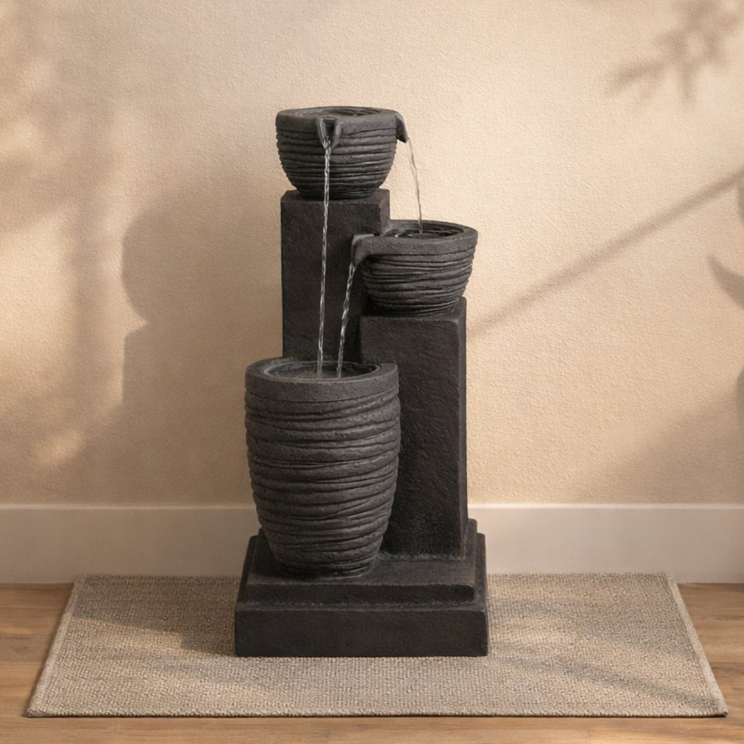 Horizontal Ribbed Pattern Outdoor Water Fountain with Warm Glow Lighting