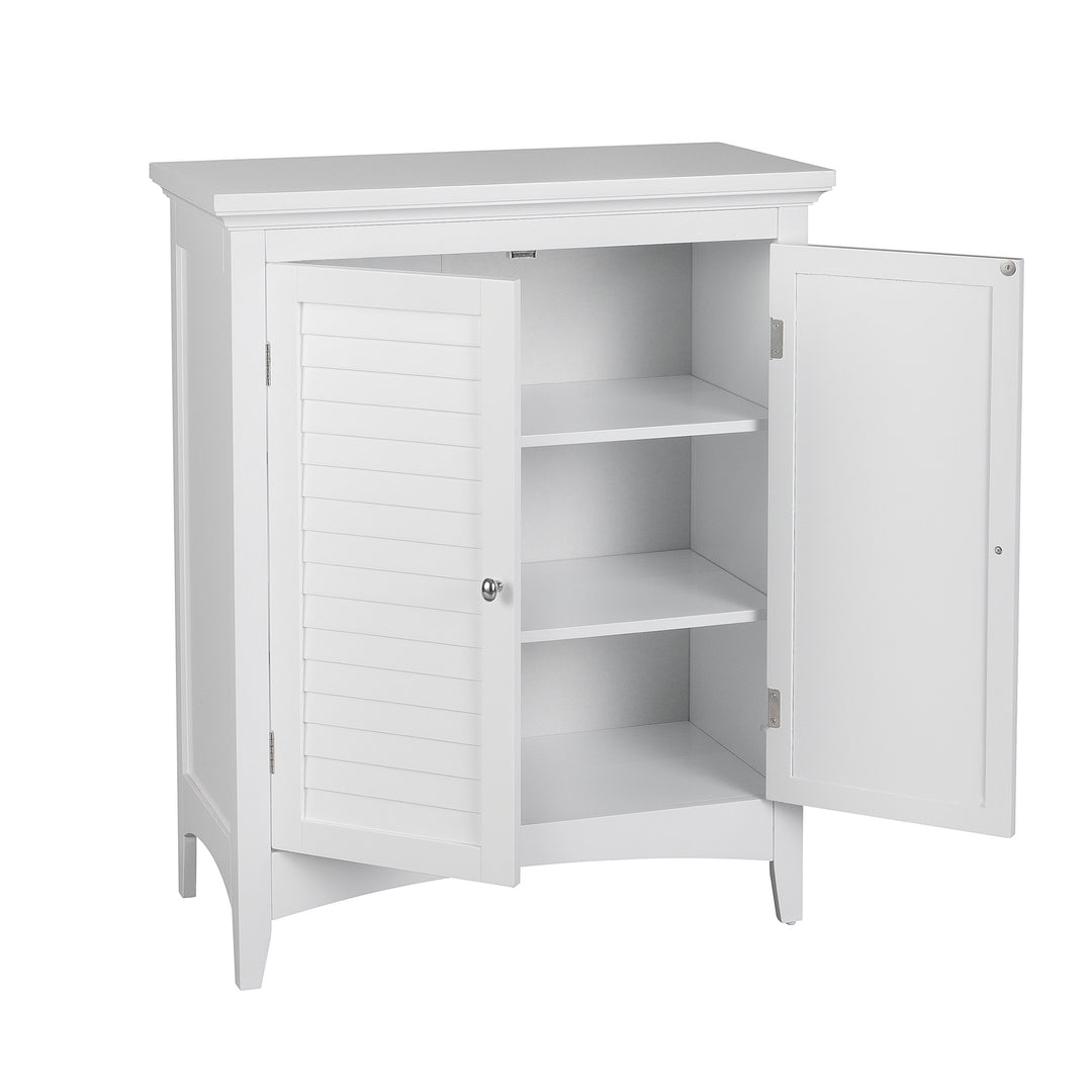 A two-door white floor cabinet with the doors opened