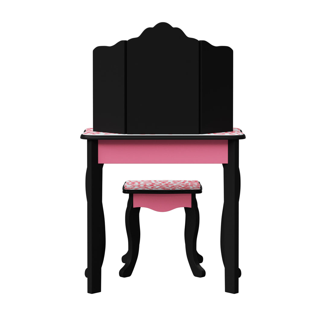 Back view of a child's black and pink vanity set